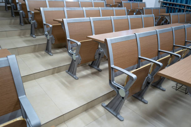 istock Desks and chairs in the trapezoidal classroom 1449283438