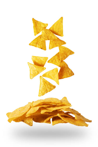 istock Levitation of corn nacho chips on a white background. Mexican snack 1449286614