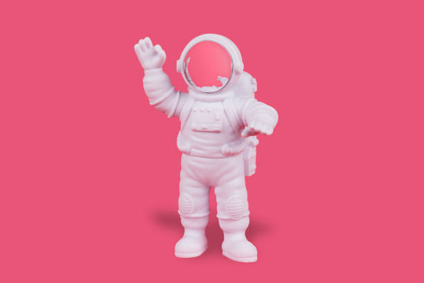 istock Astronaut making the ok sign on magenta background 1449289843