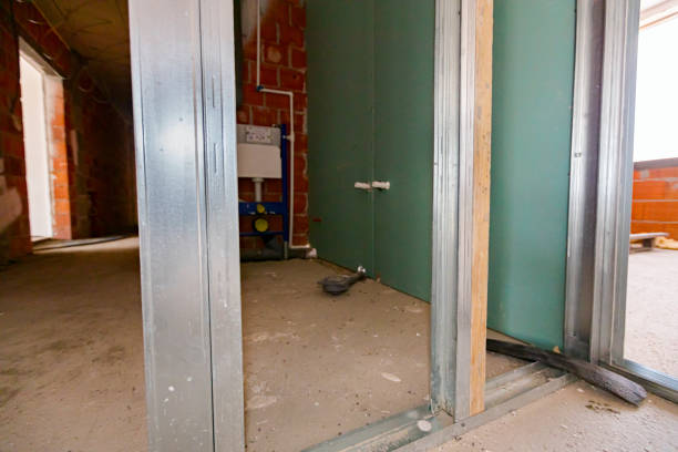 istock Frame for plasterboard wall, mounted vertical metal and wooden profiles, work in progress of unfinished edifice 1449291493