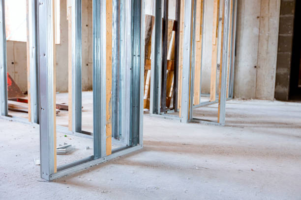 istock Frame for plasterboard wall, mounted vertical metal and wooden profiles, work in progress of unfinished edifice 1449293917