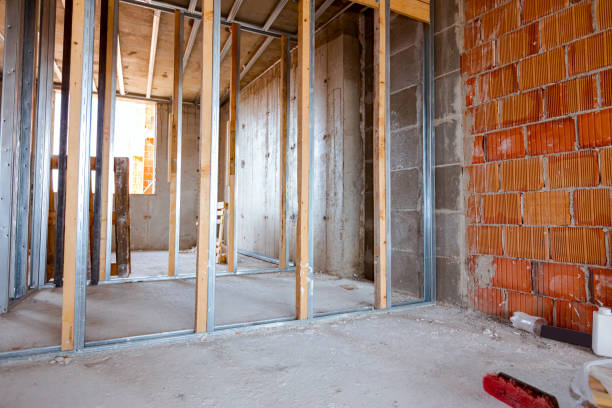 istock Frame for plasterboard wall, mounted vertical metal and wooden profiles, work in progress of unfinished edifice 1449293934