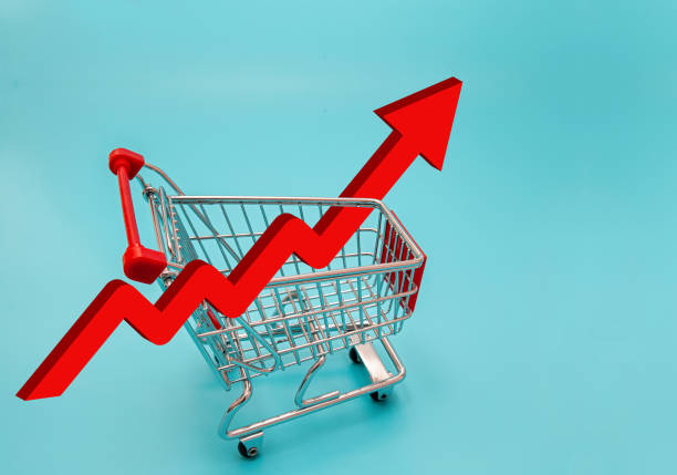Shopping Cart with red up arrow symbol on blue background.
