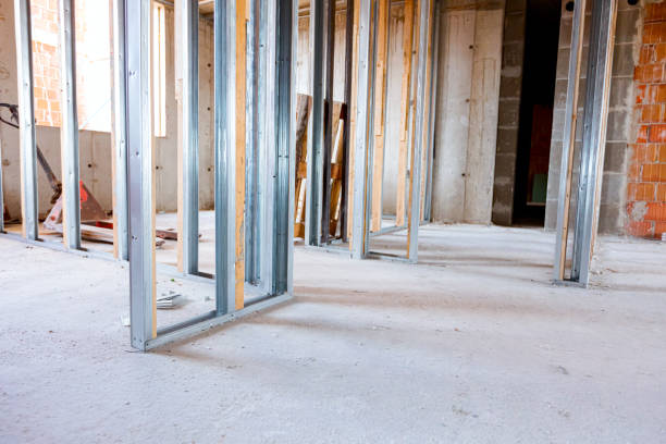 istock Frame for plasterboard wall, mounted vertical metal and wooden profiles, work in progress of unfinished edifice 1449294123