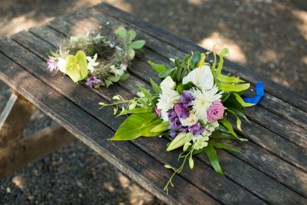 istock wedding bouquet and wreath on a wooden table 1449298271