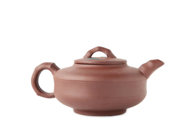 istock Clay teapot isolated on a white background 1449298439