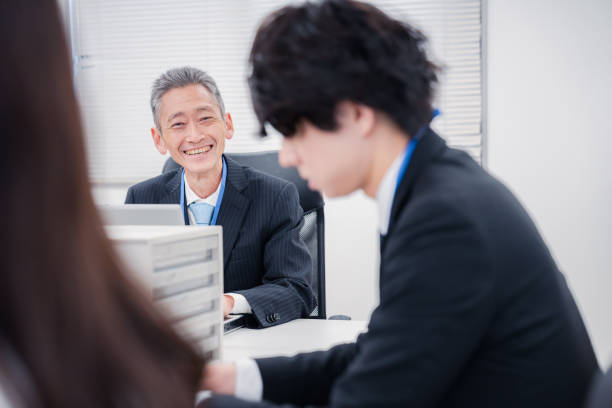 White collar workers are working at the office. They are stay together and meeting. Employee and teamwork concept.