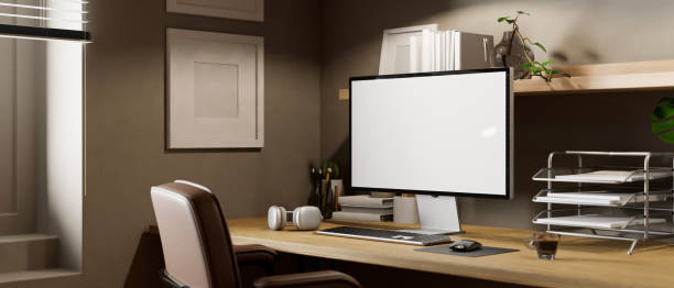 istock Modern contemporary workstation with computer and decor on wood table against the grey wall 1449305139