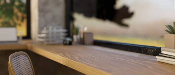 istock Side view, Copy space on wood tabletop in minimal and comfortable working room interior design 1449305180