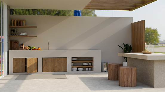 Modern outdoor kitchen exterior design in wood and cement material with kitchen island, wood stools, sink, kitchen appliances and decor. pool villa, resort, luxury home. 3d render, 3d illustration