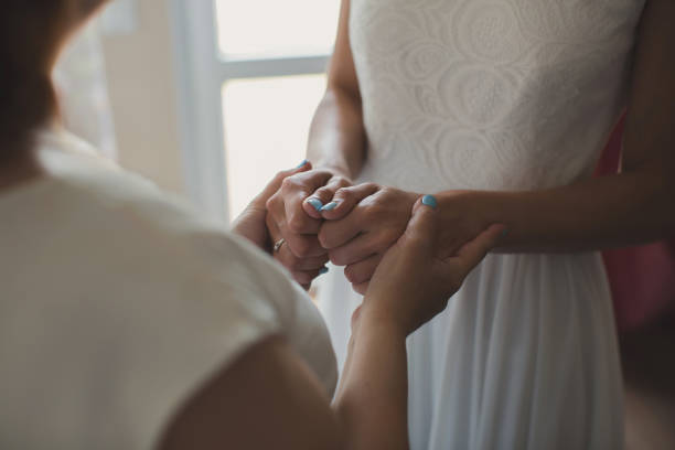 istock Mom holds her daughter's hand. 1449305479