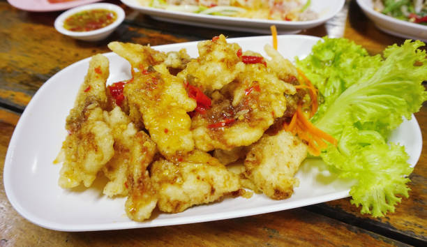 istock Deep-fried grouper with hot sweet and sour sauce 1449307801