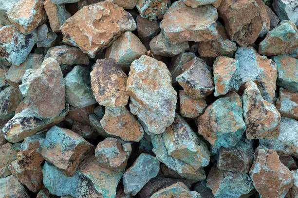 Heap of amazonite crystal mineral rock. gemstone for decoration or exterior