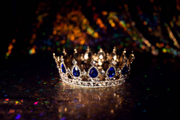 istock Golden vintage crown with blue gemstones. Sapphire. 1449314936
