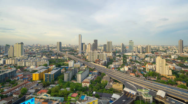 Aerial view of Bangkok Downtown Skyline, Thailand. Financial district and business centers in smart urban city in Asia. Skyscraper and high-rise buildings at sunset. stock photo