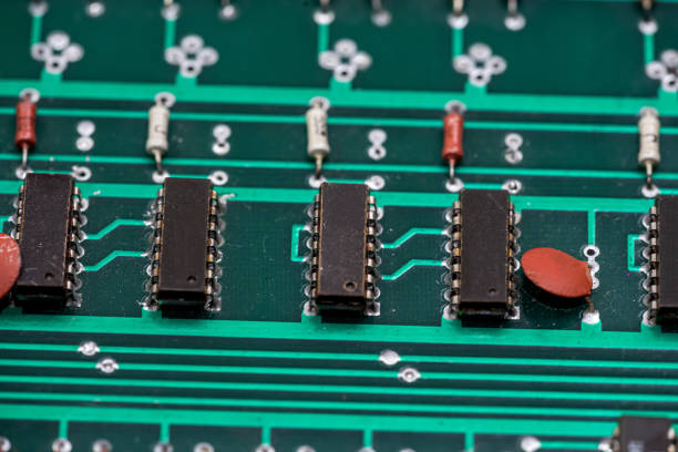 istock closeup of green  electronic computer hardware. Circuit design. 1449317745