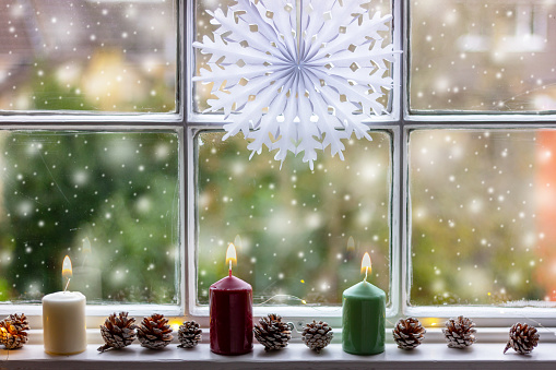 winter, New Year and Christmas decorations on a old wooden window