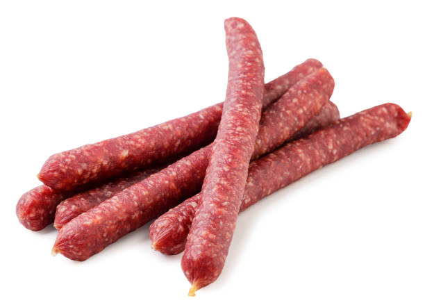 istock Thin sausages close-up on a white background. 1449317982
