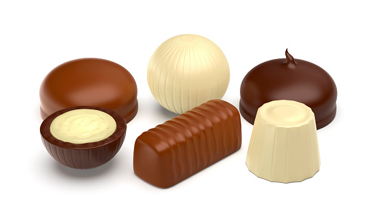 Six different chocolate candies on white background
