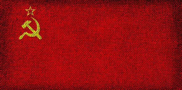 Flag of the USSR with the texture of rough fabric. Stylized image of the Soviet flag.