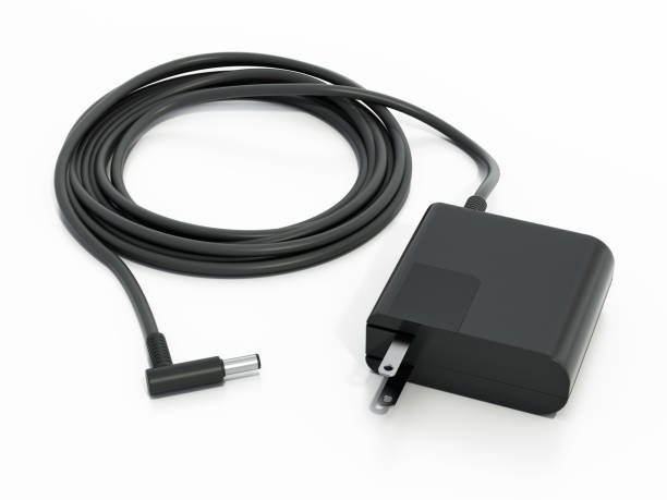 istock Modern black laptop battery charger isolated on white 1449328053