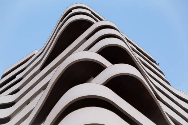 istock low angle view of an architectural building with curved shape 1449330265
