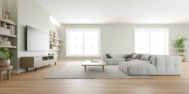 istock 3D rendering of modern living room with TV screen on grey wall. 1449331461