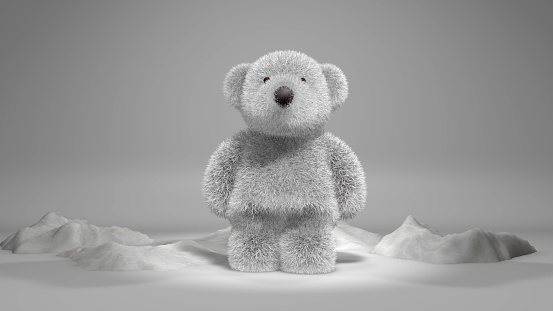 Cute brown teddy bear on white background. Toy animal doll plush stuffed sitting in the studio.