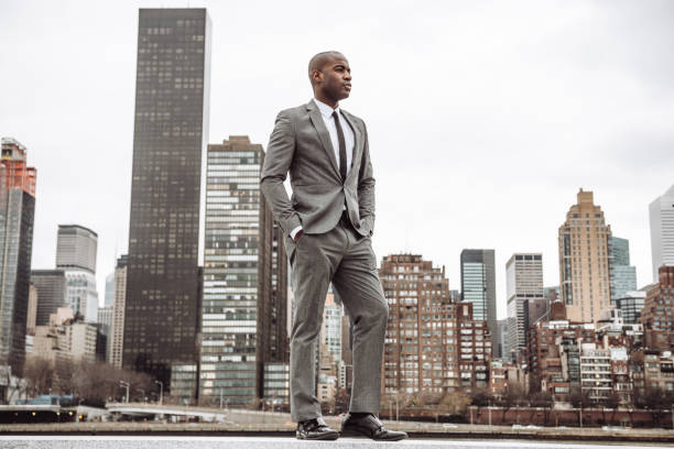 istock businessman looking ahead watching the future 1449337163
