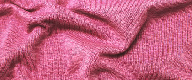 istock burgundy viva magenta wrinkled plush fabric background texture, soft material pattern 1449337972