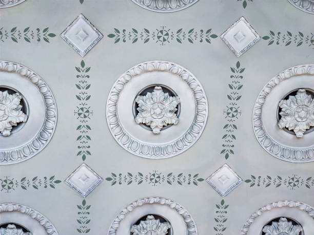 istock Decorative stucco pattern on the ceiling. Concept of interior decoration. Modern architecture. 1449341531
