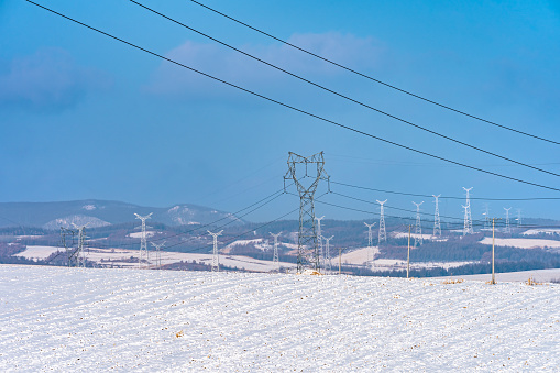 Electricity pylons on the hills seen in the rural area of Mudanjiang City, Heilongjiang province, China.