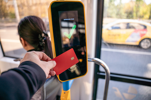 Paying passage by plastic card in public transport