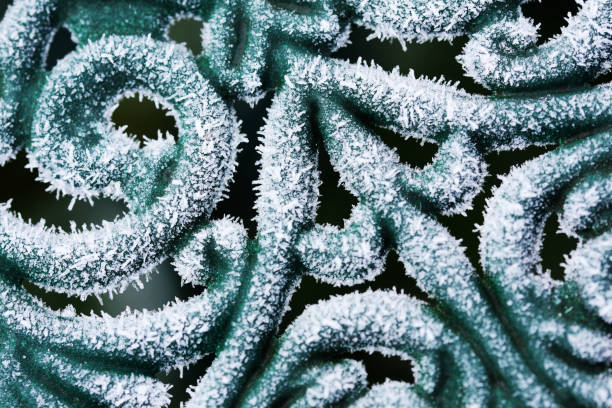 Frost on surface of ornate table close up stock photo