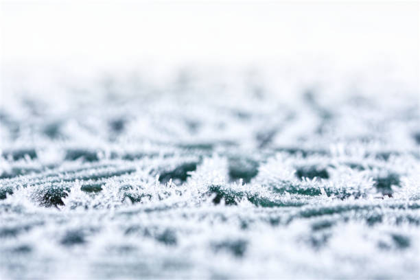 Icy frost on table in winter close up stock photo