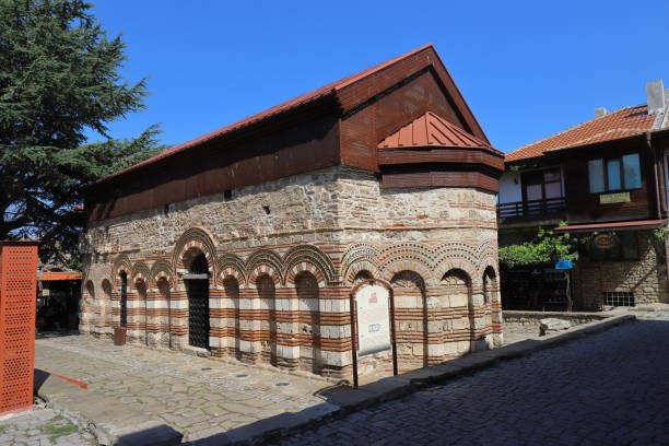 The south wall with the entrance of the Church of Saint Paraskevi in Nessebar stock photo