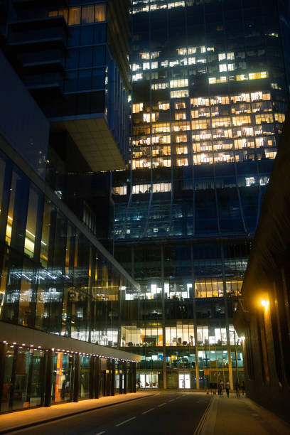 istock Office building exterior at night illuminated 1449362548