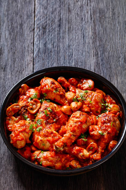 istock chicken stew with mushrooms in a tomato sauce 1449366638