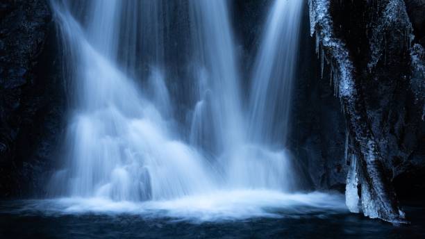 istock Closeup of a waterfall with long exposure effect at dawn 1449367716