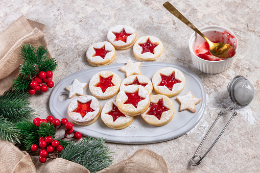 Linz cookies with jam in Christmas decorations, traditional cookies Austria