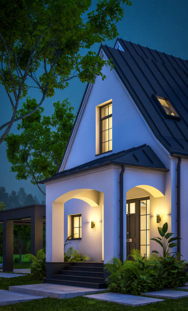 istock 3d rendering of white and black modern Tudor house in night 1449371181
