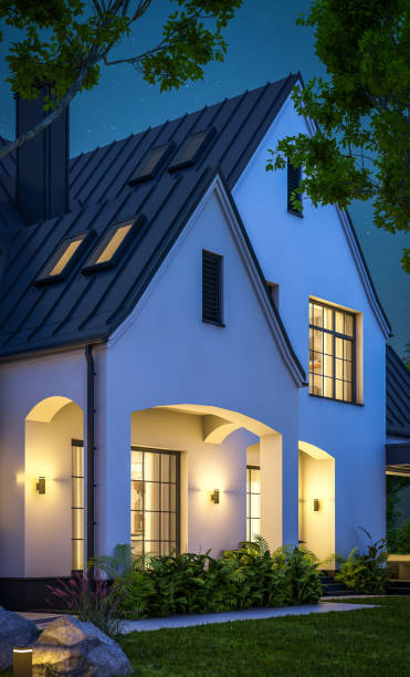istock 3d rendering of white and black modern Tudor house in night 1449371187