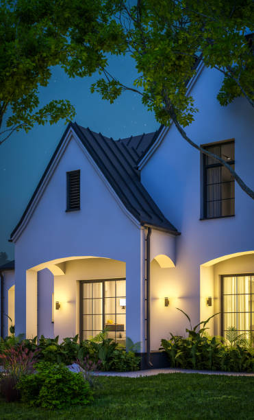 istock 3d rendering of white and black modern Tudor house in night 1449371287