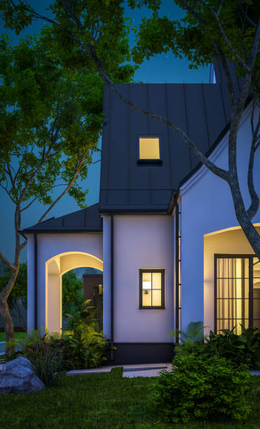 istock 3d rendering of white and black modern Tudor house in night 1449371305