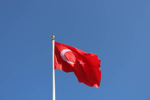istock Turkish flag waving in the sky. 1449375515