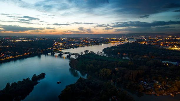 istock Cityscape and river at dusk - aerial view 1449380382