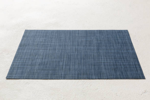 istock Perspective view of blue tablecloth for food on cement background. Empty space for your design 1449382714