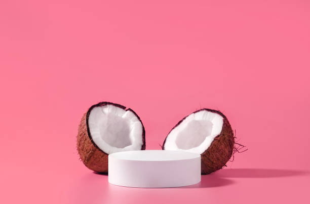 istock Cosmetic product design. White circle mockup podium and coconuts for beauty product presentation. Front view. 1449385236
