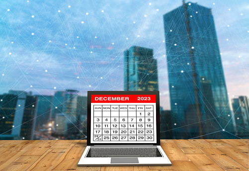 December 2023 calendar on laptop