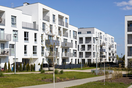 The white facade of a new housing estate